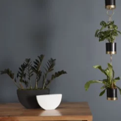 7.75”H X 13.5”L X 3.5”W BLACK CERAMIC ANNELI BOAT -Quality Wholesale Shop accent decor 775h x 135l x 35w black ceramic annel 2