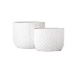 9.5”H X 12.5”L X 5”W SMALL MATTE WHITE CERAMIC TALL OVAL EMBOSSED DOTTED